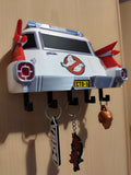 3D printed Ghostbusters Ecto-1 key holder mounted on wall with keys hanging from five hooks