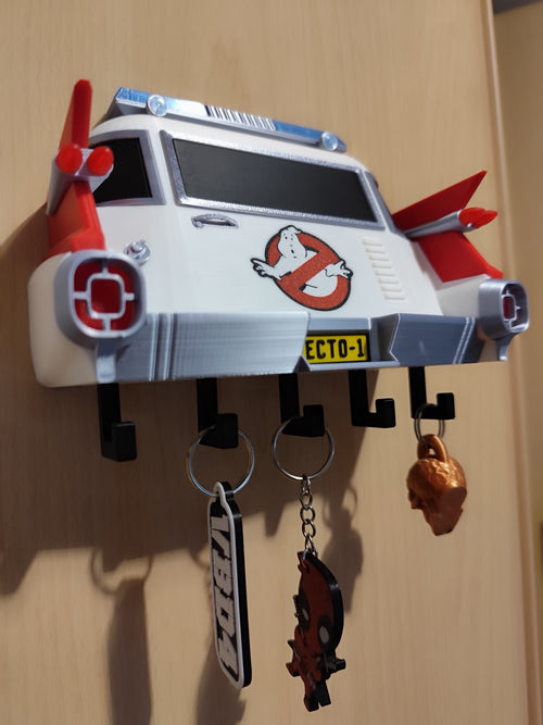3D printed Ghostbusters Ecto-1 key holder mounted on wall with keys hanging from five hooks