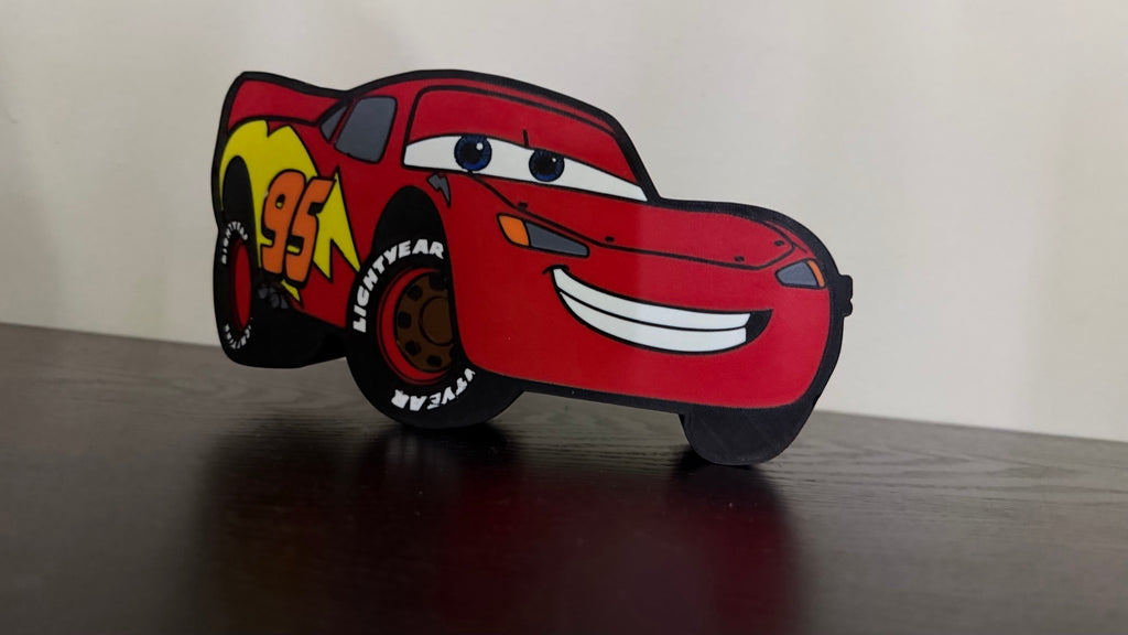 Lightning McQueen 3D printed lightbox displayed unlit in daylight