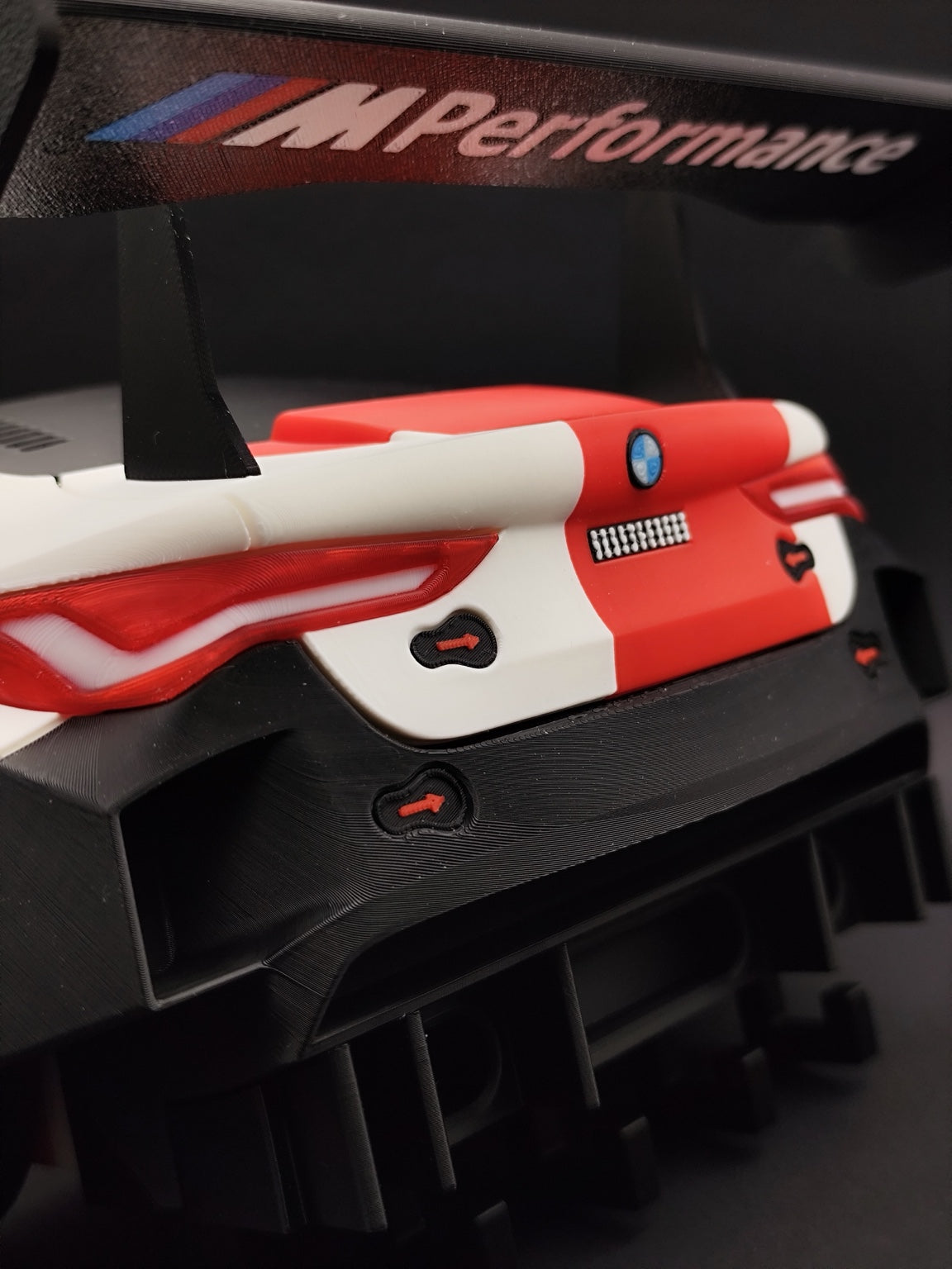 Close-up of the M4 GT3 rear bumper taillights and M Performance wing