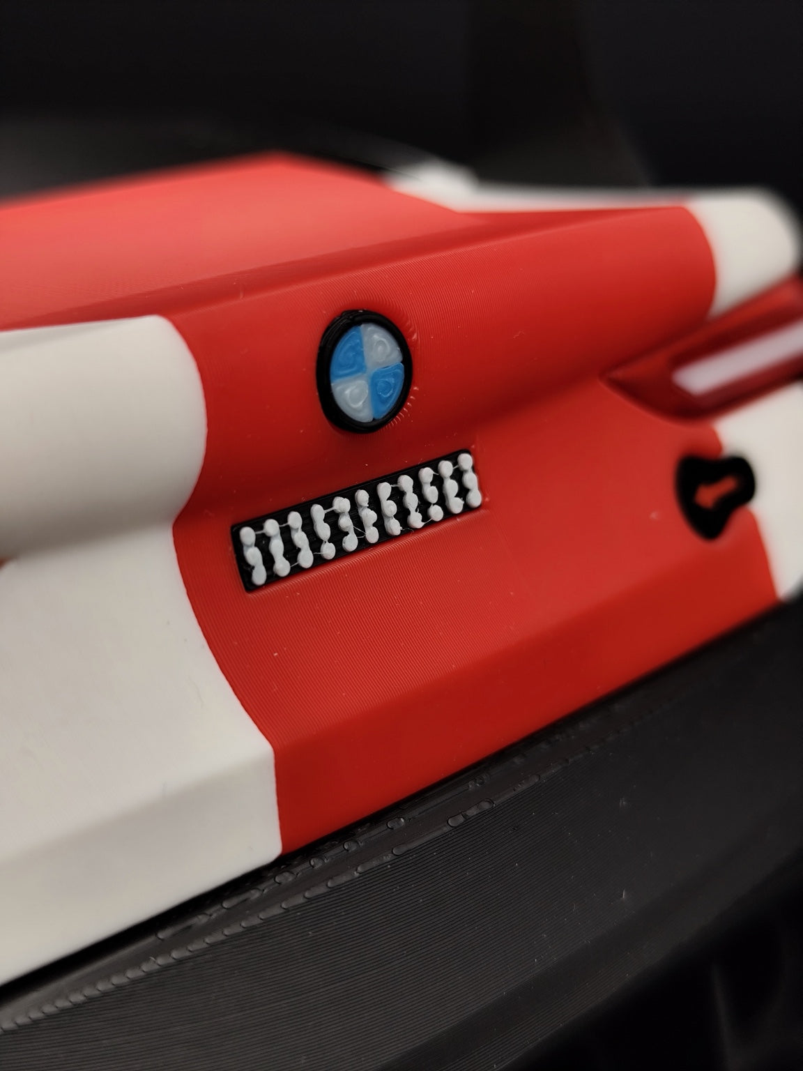 Close-up of the M4 GT3 rear badge and center body panel