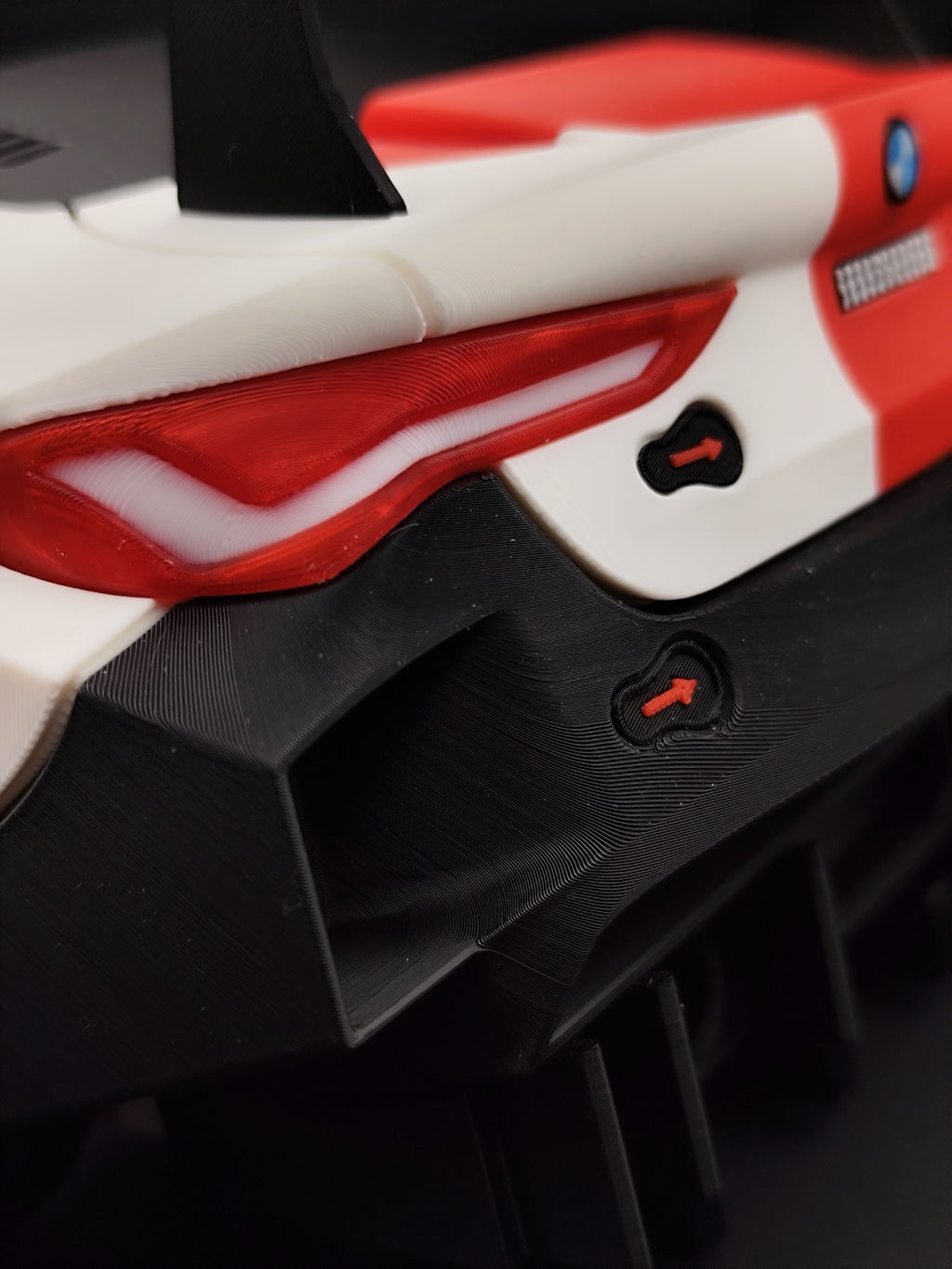 Close-up of the M4 GT3 taillight and black rear bumper