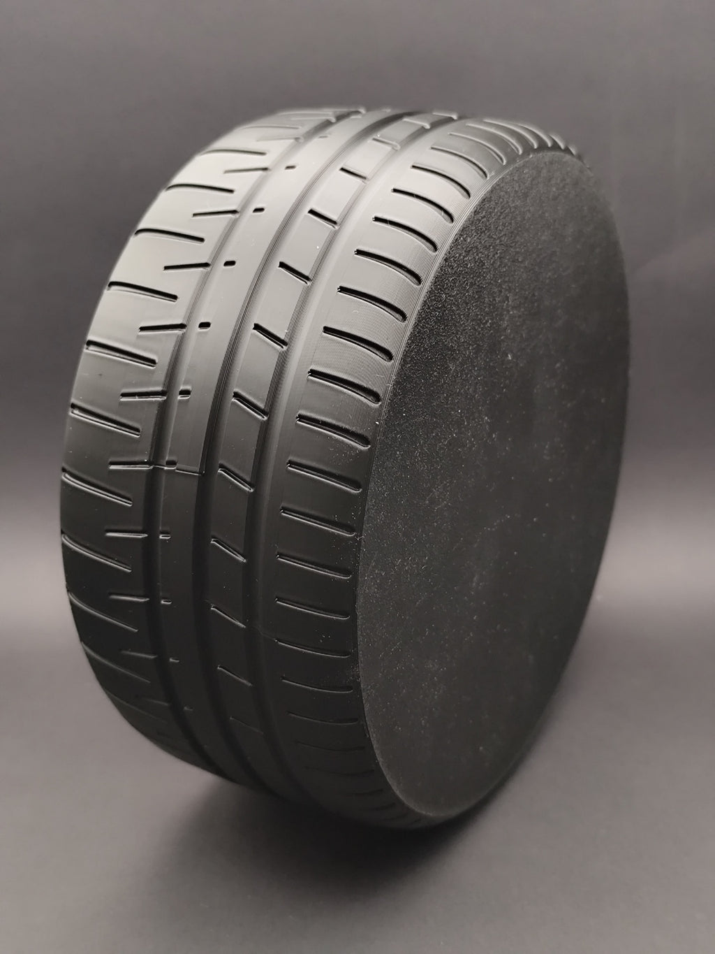 Underside of the 3D printed tire storage bowl with flat circular base