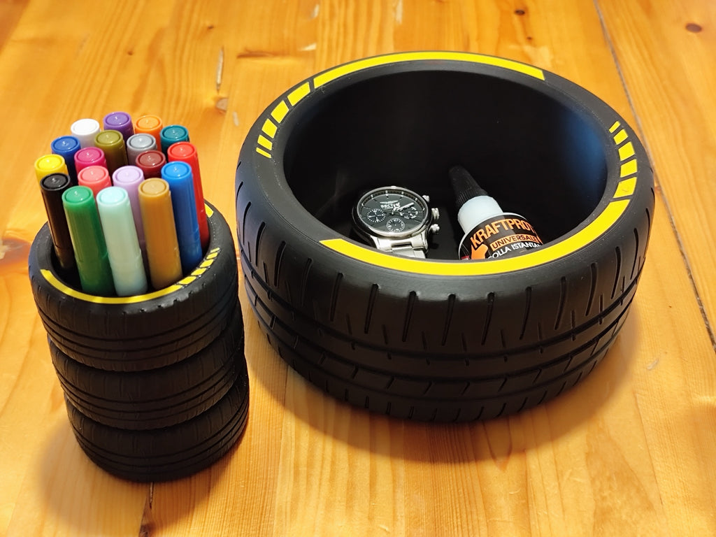 Matching tire pen holder and catchall bowl with markers and accessories for display